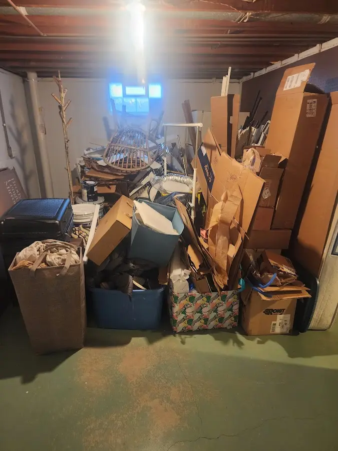 Roll-off dumpster container at job site for 20 Yard Dumpster Rental in Randolph